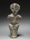 女性人物；来自塞尔维亚的温查文化；公元前4500-3500年；涂以油漆的烧制黏土；全长16.1公分；克利夫兰艺术博物馆（美国俄亥俄州）
