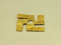 万字形金饰片，藏于大理市博物馆